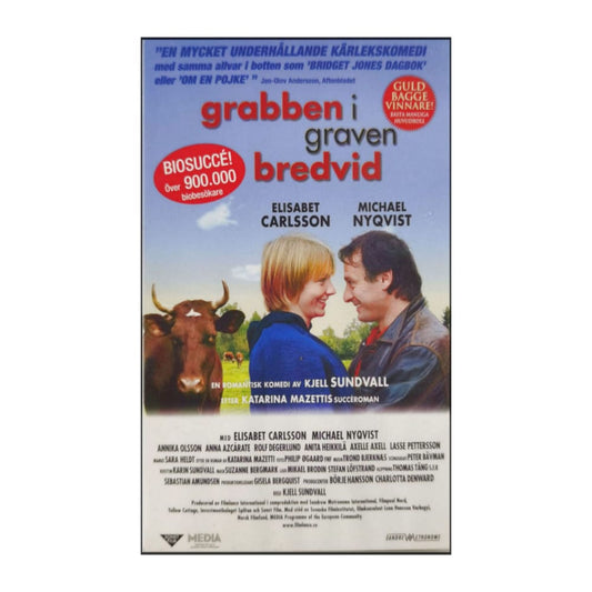 Grabben I Graven Bredvid